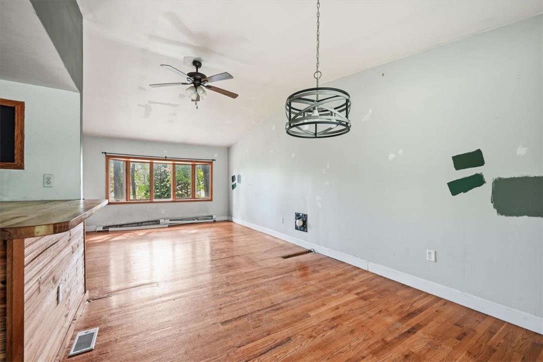 9870 North Delaware Drive Bangor, PA 18013 - Photo 22 of 62 Gleaming hardwood floors and a vaulted ceiling elevate this open, versatile living space.