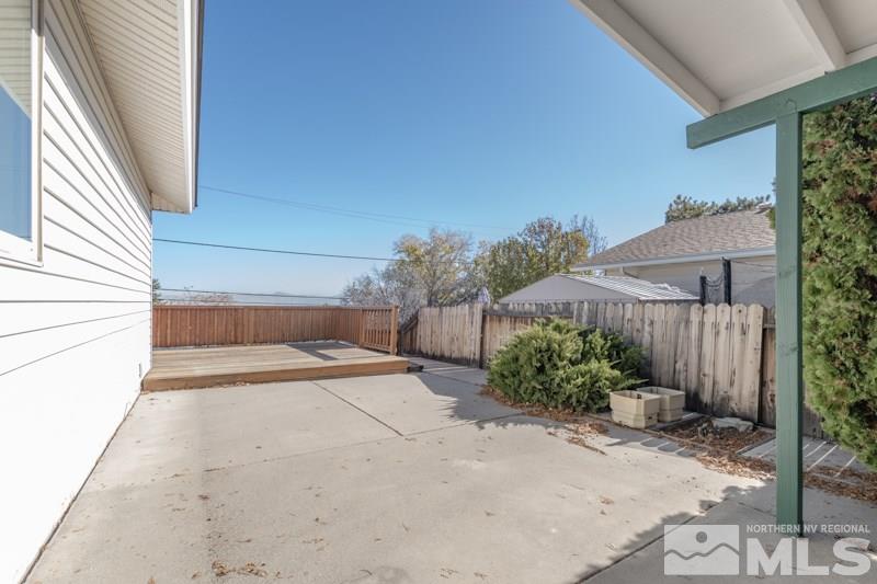1670 Alamo Street Reno, NV 89503 - Photo 18 of 25 a view of a backyard with potted plants
