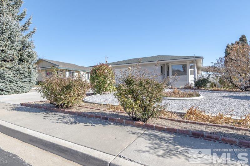 1670 Alamo Street Reno, NV 89503 - Photo 4 of 25 a front view of a house with garden