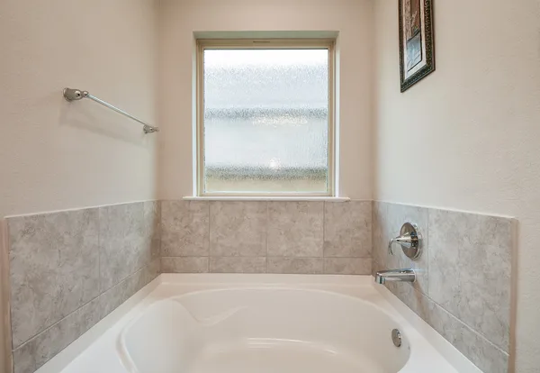 a bathroom with a bathtub