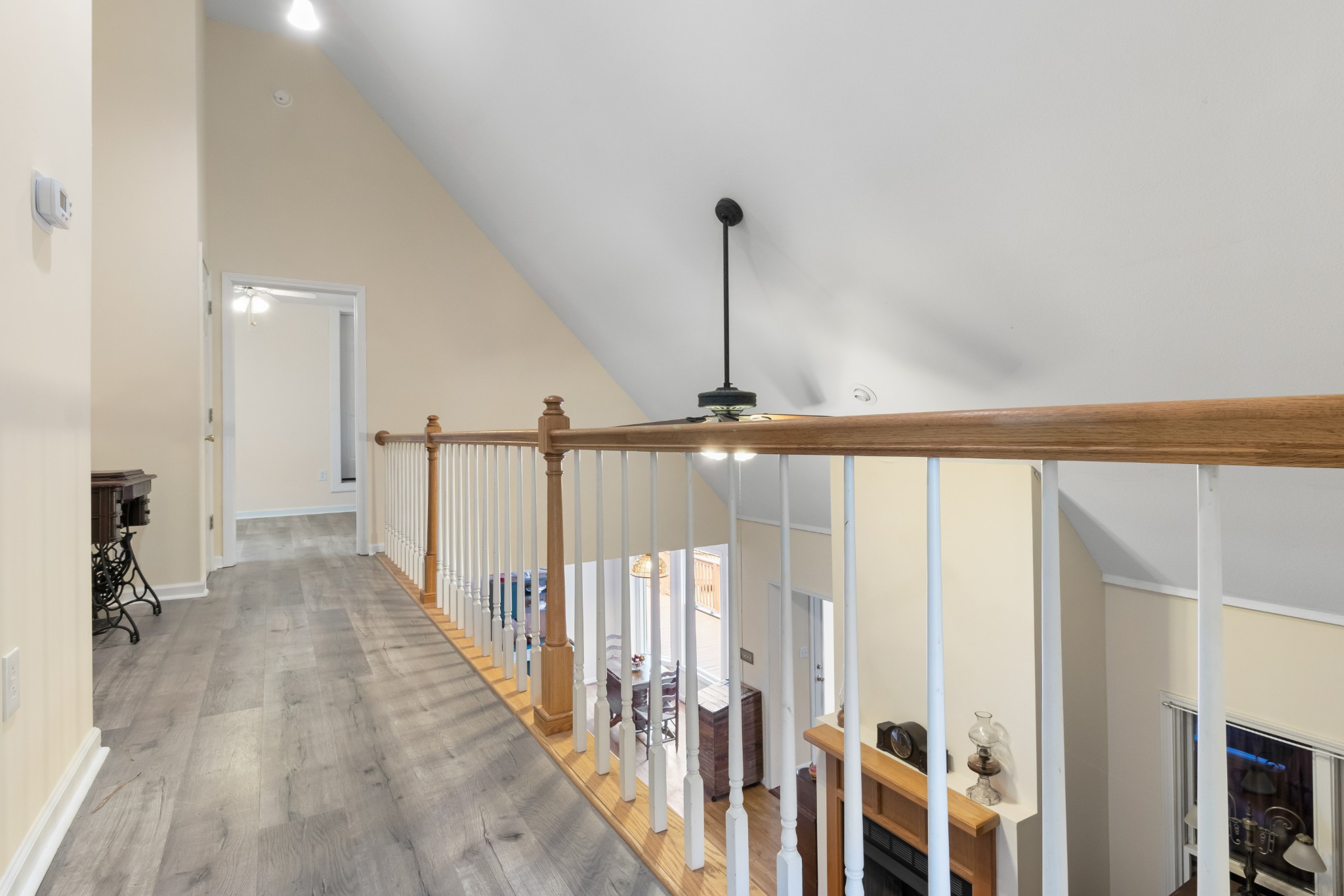 3710 Marthas Chapel Road Cunningham, TN 37052 - Photo 29 of 50 a view of a hallway with wooden floor and staircase