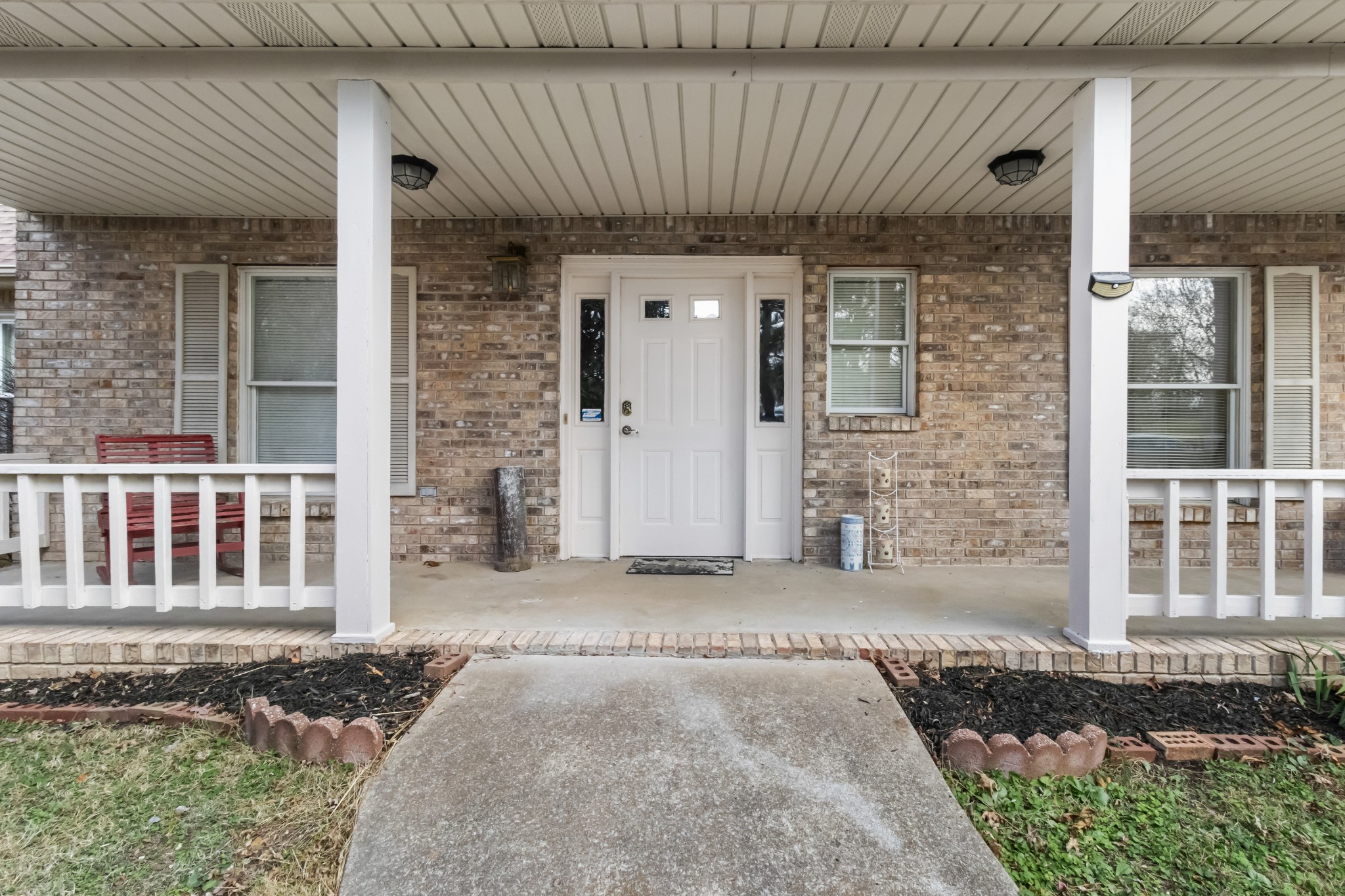3710 Marthas Chapel Road Cunningham, TN 37052 - Photo 3 of 50 a front view of a house with a wooden fence