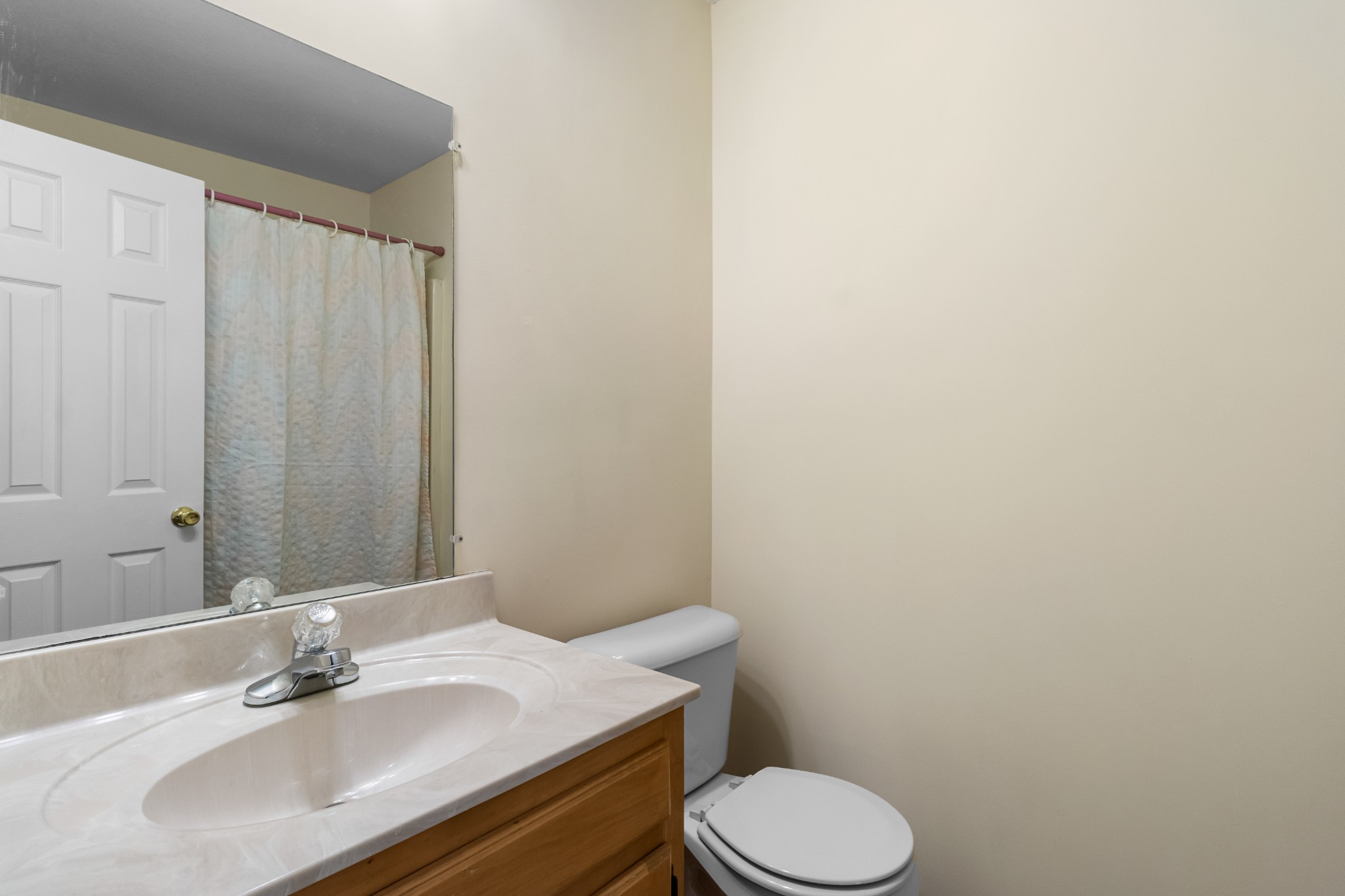 3710 Marthas Chapel Road Cunningham, TN 37052 - Photo 32 of 50 a bathroom with a sink toilet and a mirror
