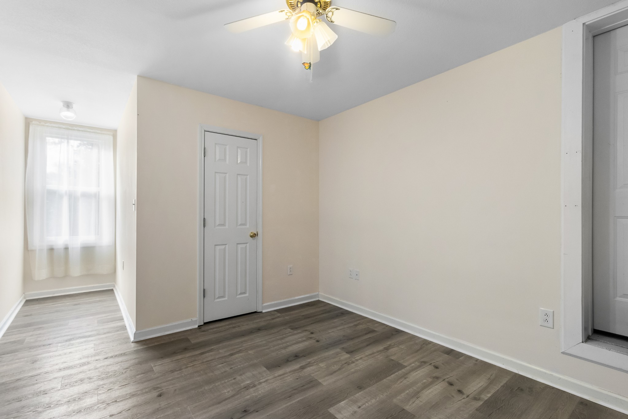 3710 Marthas Chapel Road Cunningham, TN 37052 - Photo 33 of 50 wooden floor in an empty room with a window