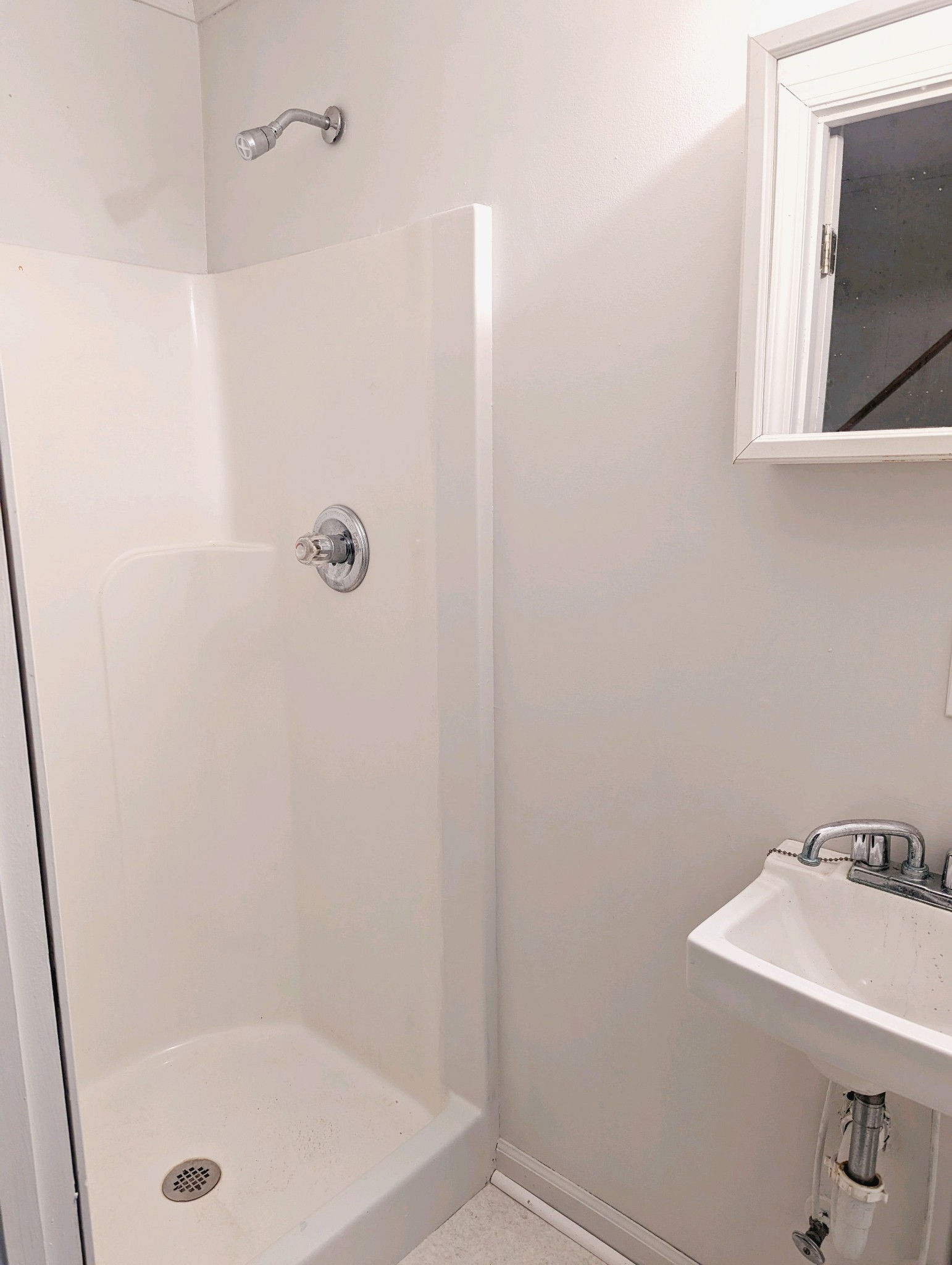 3710 Marthas Chapel Road Cunningham, TN 37052 - Photo 50 of 50 a bathroom with a sink and a shower