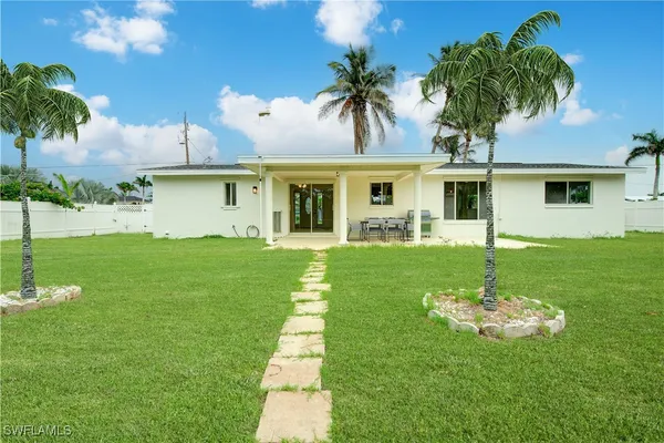 a view of a room with iron fence