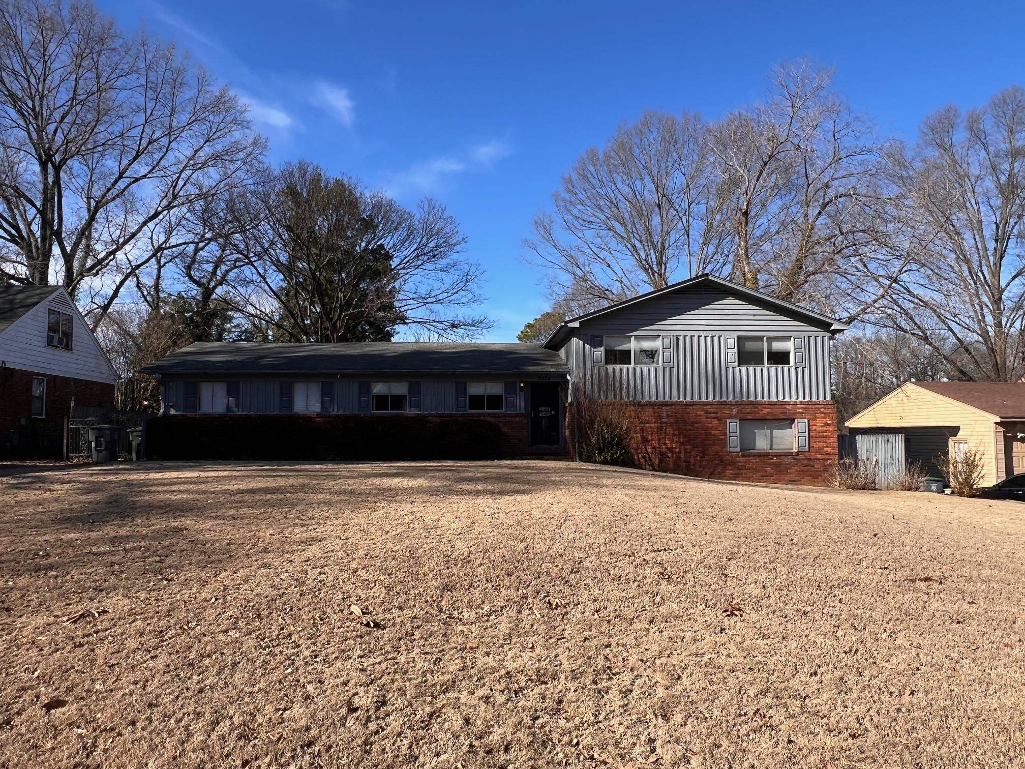 3034 Laurencekirk Road Memphis, TN 38128 - Photo 1 of 27 a front view of a house with a yard