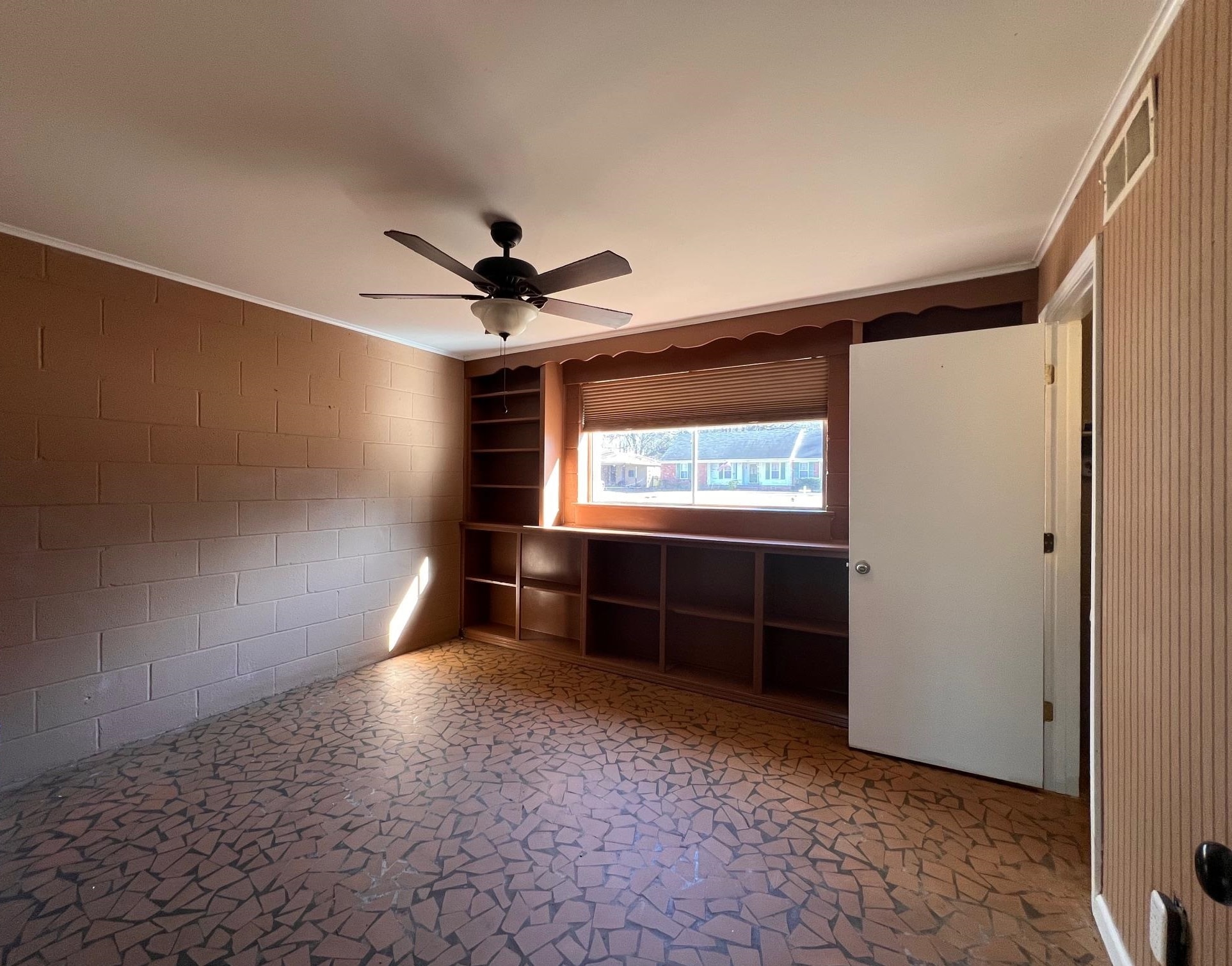 3034 Laurencekirk Road Memphis, TN 38128 - Photo 17 of 27 a view of empty room with windows and ceiling fan