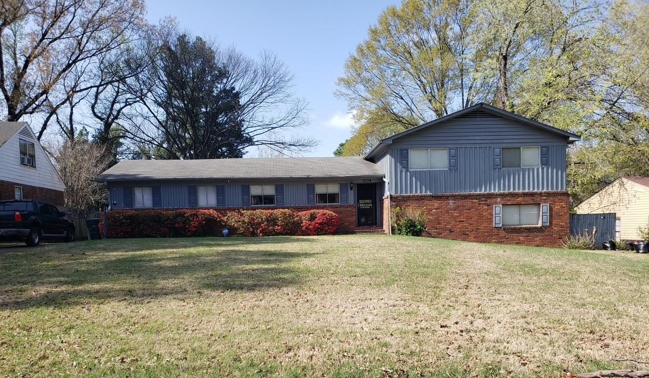 3034 Laurencekirk Road Memphis, TN 38128 - Photo 2 of 27 a view of a house with a yard