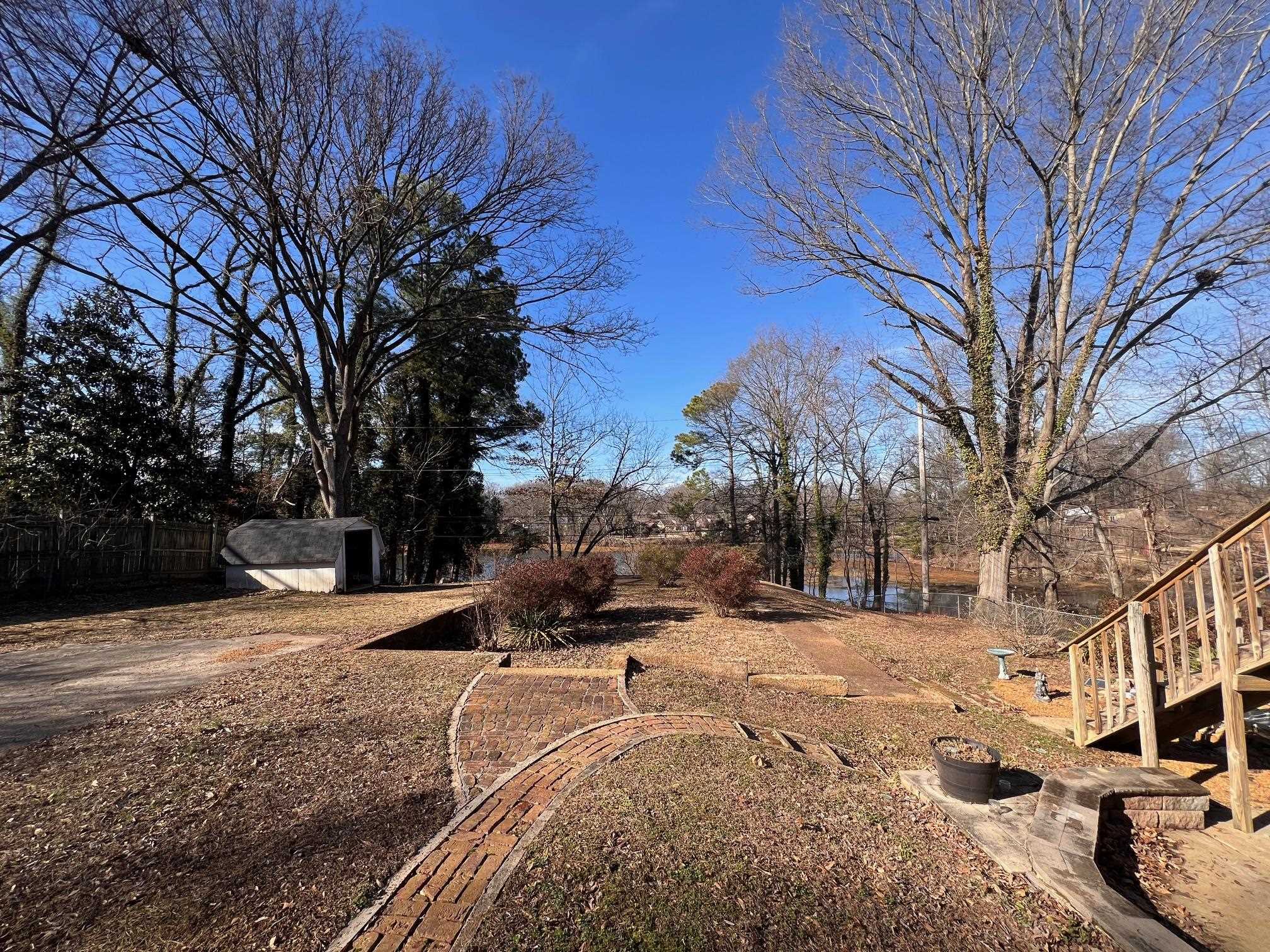 3034 Laurencekirk Road Memphis, TN 38128 - Photo 22 of 27 a view of a snow with a yard
