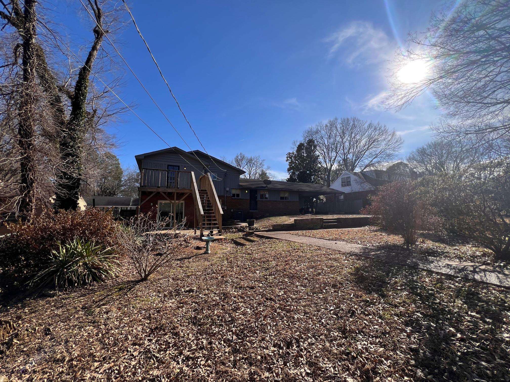 3034 Laurencekirk Road Memphis, TN 38128 - Photo 23 of 27 a backyard of a house with lots of green space