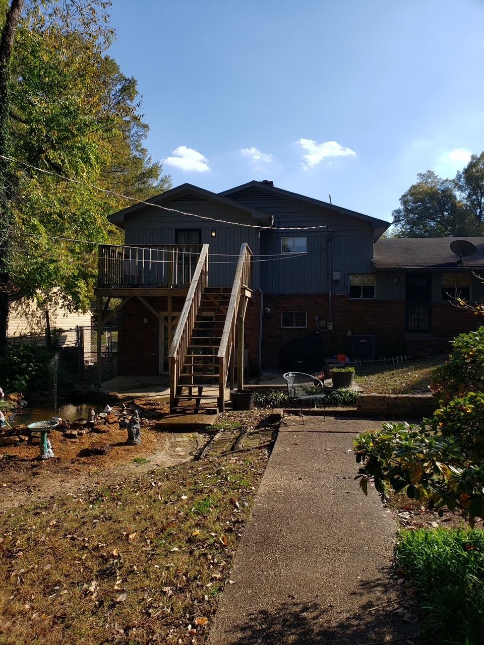 3034 Laurencekirk Road Memphis, TN 38128 - Photo 27 of 27 a view of a house with yard and tree s
