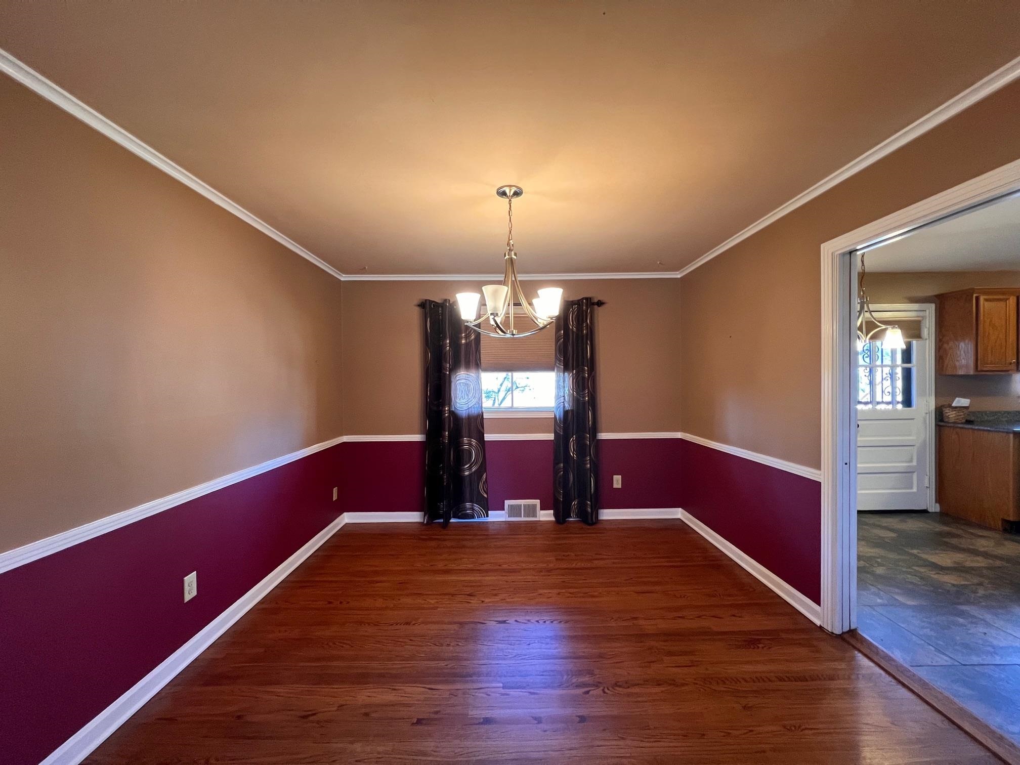 3034 Laurencekirk Road Memphis, TN 38128 - Photo 8 of 27 a living room with hard wood flooring