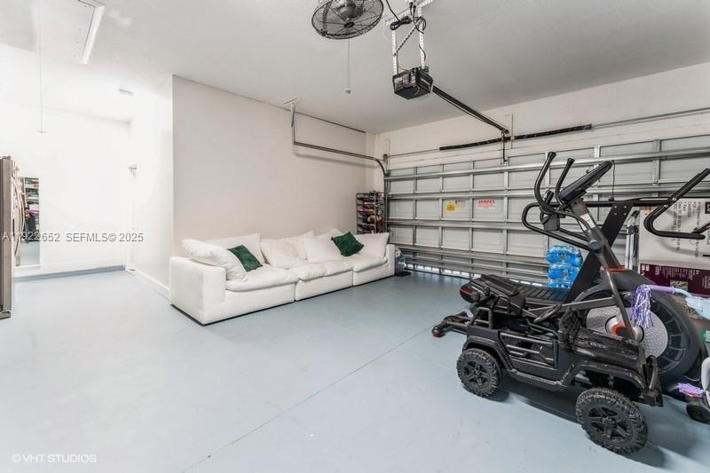 16033 Southwest 277th Street Homestead, FL 33031 - Photo 26 of 37 a view of a room with gym equipment