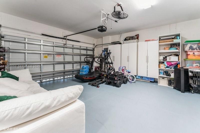 16033 Southwest 277th Street Homestead, FL 33031 - Photo 27 of 37 a view of a room with gym equipment