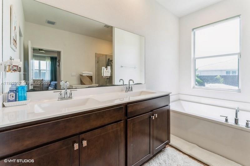 16033 Southwest 277th Street Homestead, FL 33031 - Photo 36 of 37 a bathroom with a sink and a window