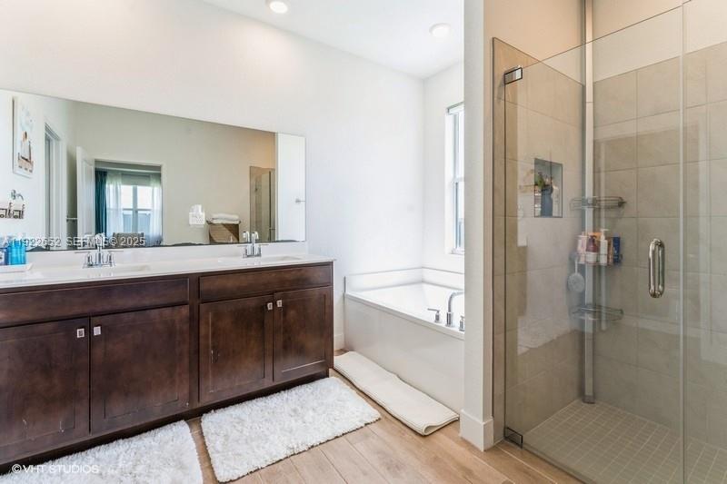 16033 Southwest 277th Street Homestead, FL 33031 - Photo 37 of 37 a bathroom with a double vanity sink a mirror and a shower