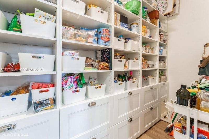 16033 Southwest 277th Street Homestead, FL 33031 - Photo 9 of 37 a room with storage and utility