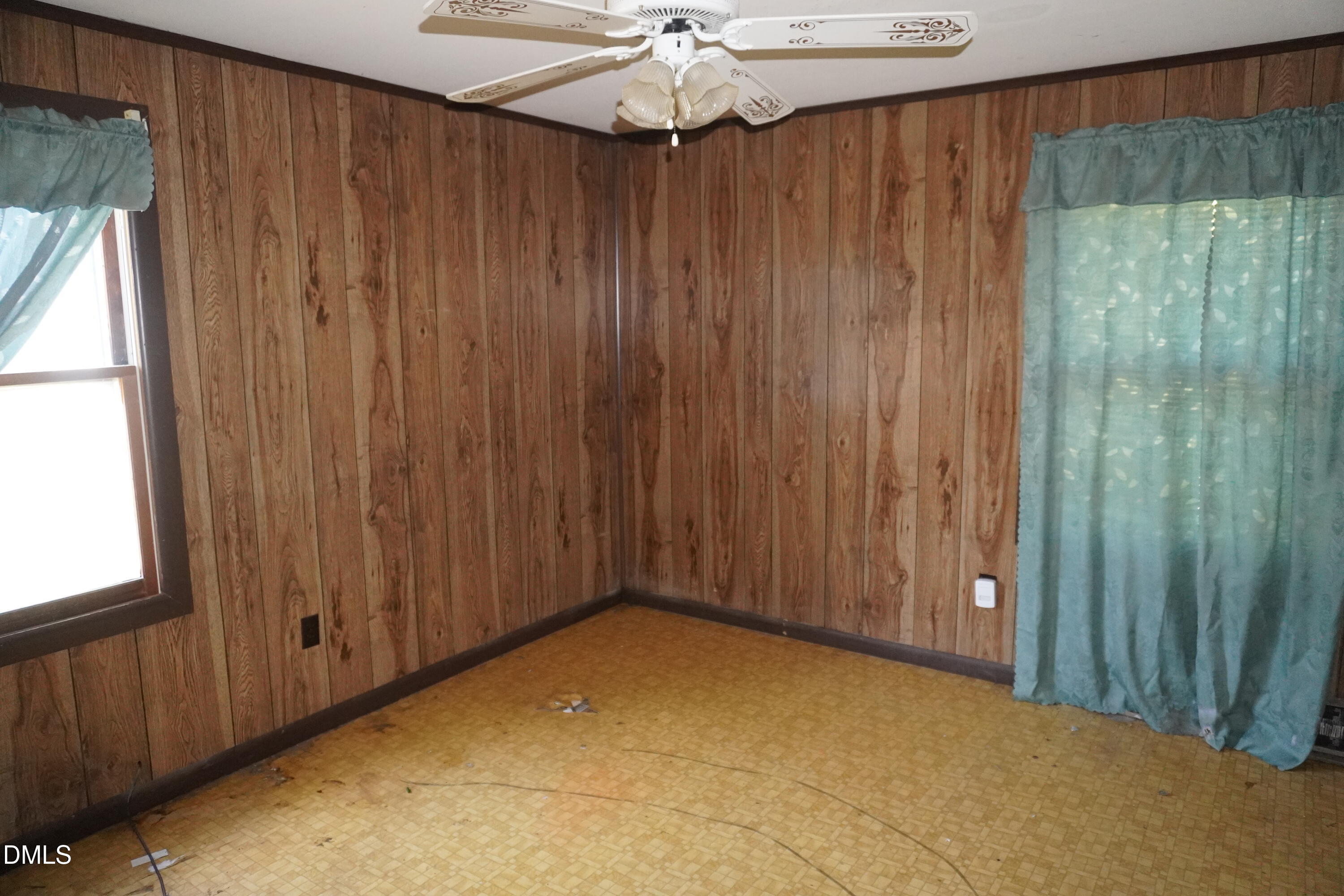 179 Lynnbank Estates Road Kittrell, NC 27544 - Photo 13 of 16 a view of a room with a window and a chandelier fan