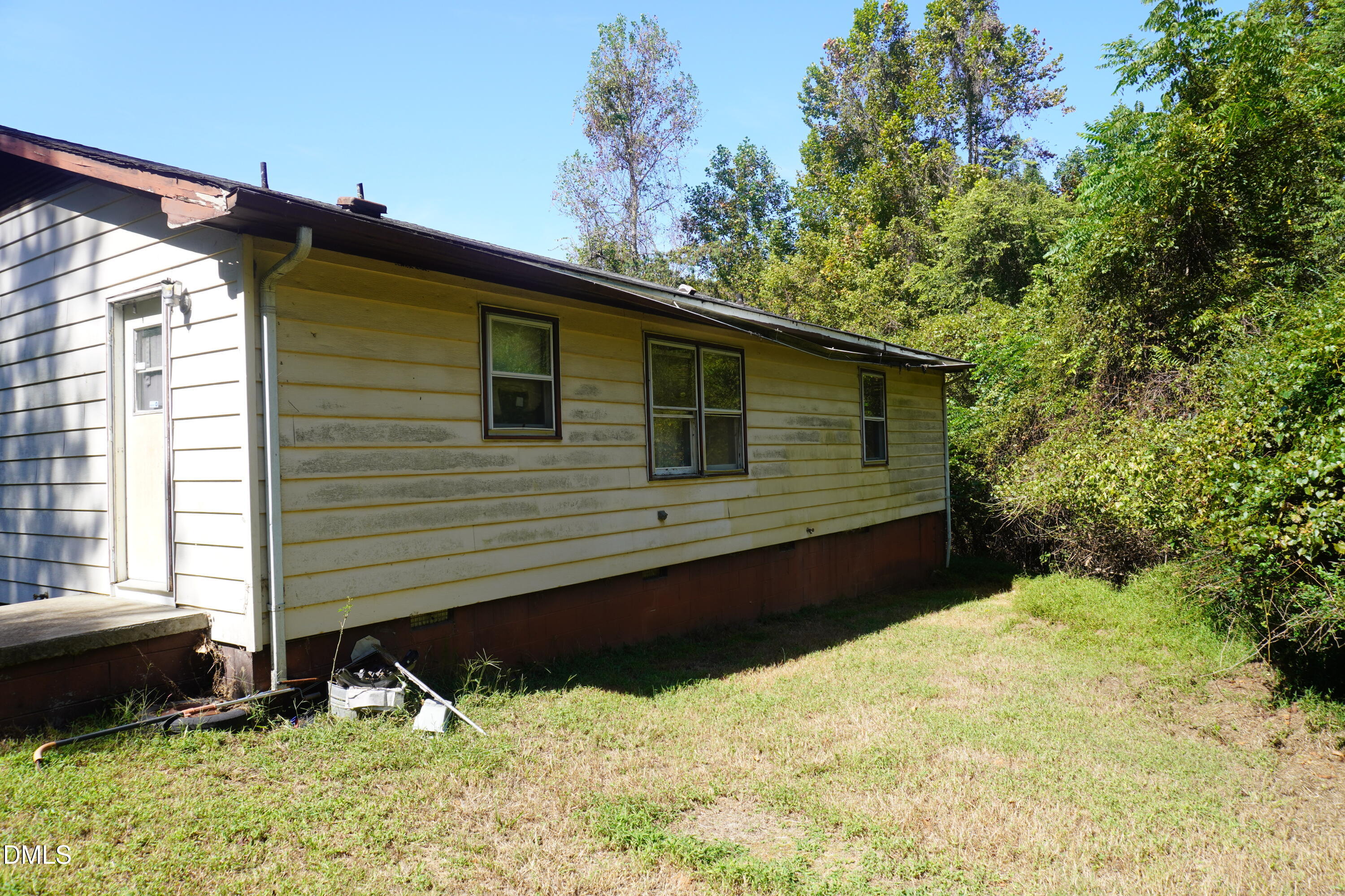 179 Lynnbank Estates Road Kittrell, NC 27544 - Photo 3 of 16 a backyard of a house with lots of green space