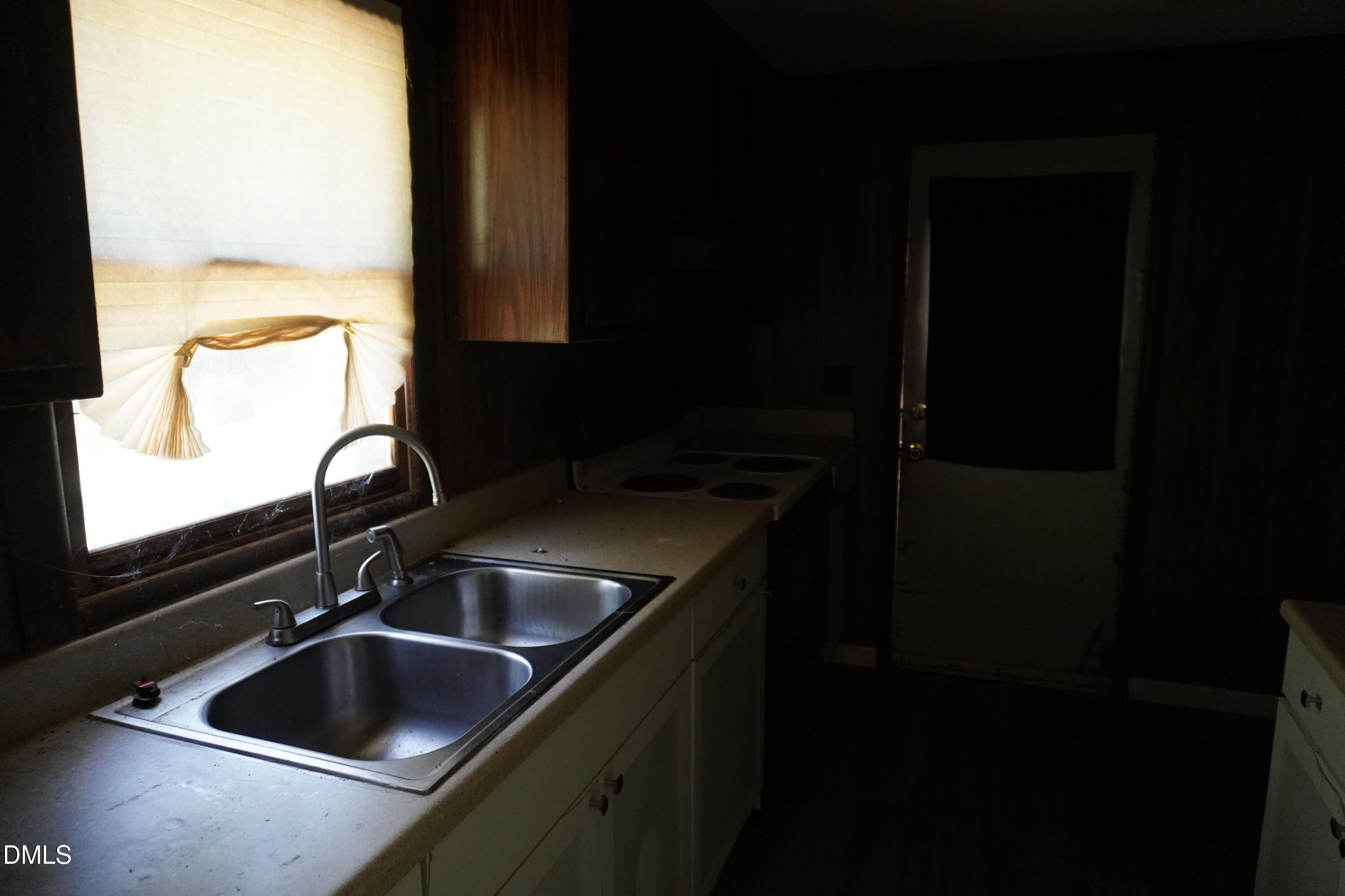 179 Lynnbank Estates Road Kittrell, NC 27544 - Photo 6 of 16 a kitchen with a sink and a window