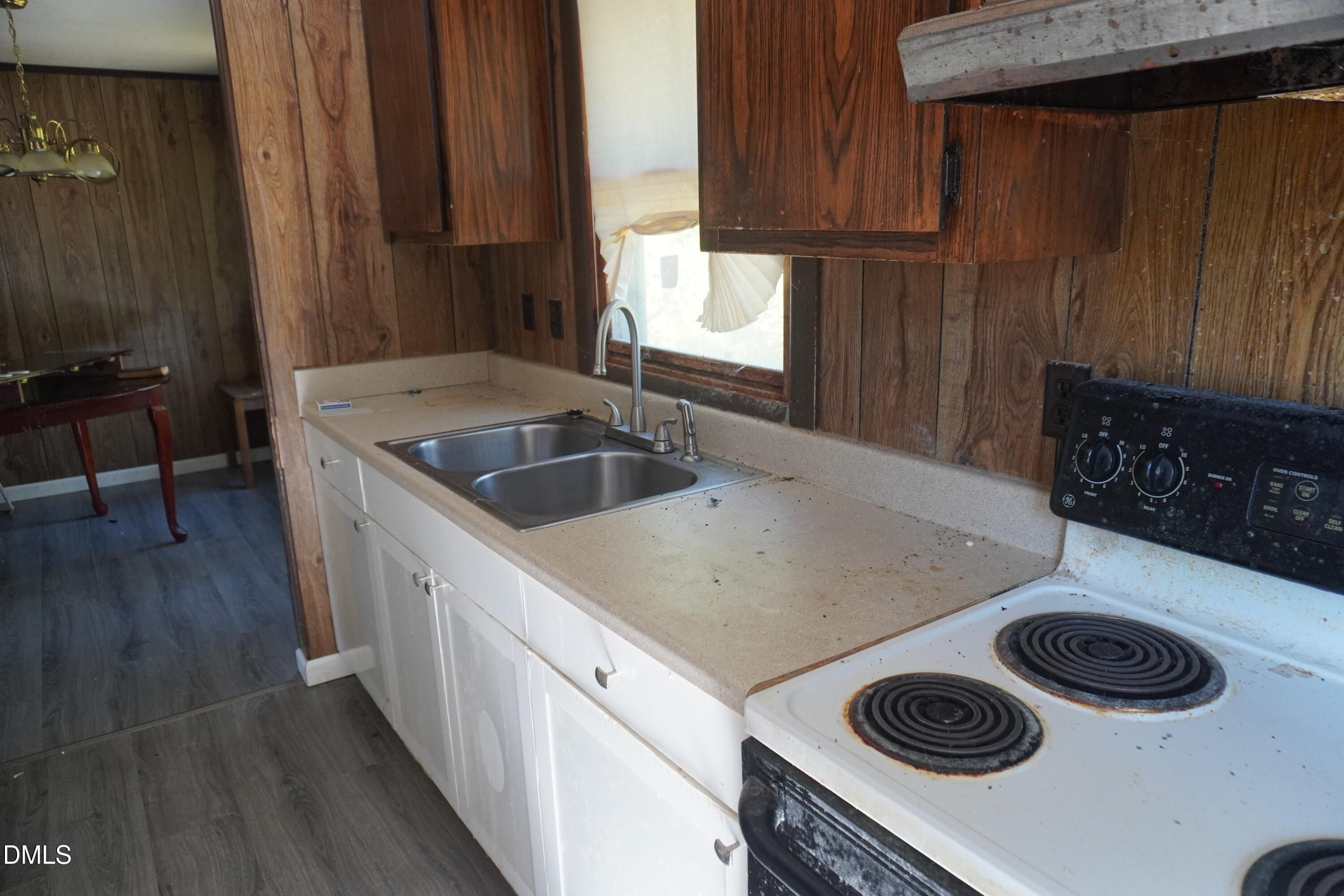 179 Lynnbank Estates Road Kittrell, NC 27544 - Photo 9 of 16 a kitchen with a stove and a sink