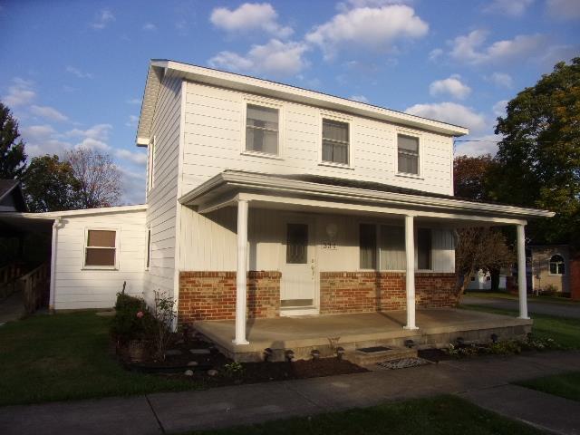 334 Madison Street Sligo, PA 16255 - Photo 1 of 24 a front view of a house with a yard