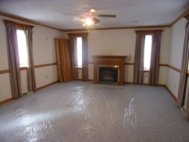334 Madison Street Sligo, PA 16255 - Photo 11 of 24 a view of empty room with window and fireplace