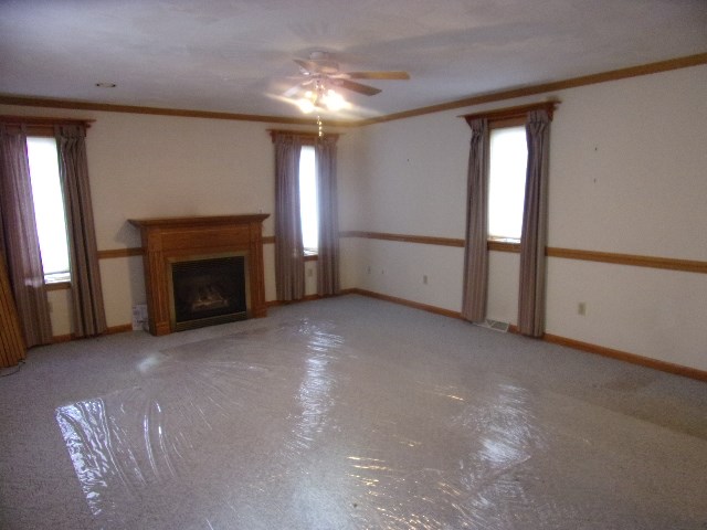 334 Madison Street Sligo, PA 16255 - Photo 12 of 24 a view of empty room with window and fireplace