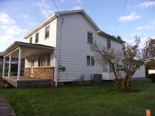 334 Madison Street Sligo, PA 16255 - Photo 2 of 24 a view of a house with a yard
