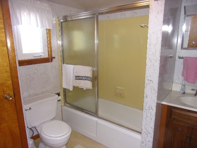 334 Madison Street Sligo, PA 16255 - Photo 23 of 24 a bathroom with a shower and a toilet