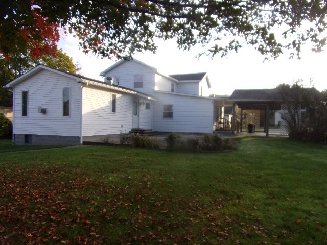 334 Madison Street Sligo, PA 16255 - Photo 3 of 24 a front view of house with yard and green space
