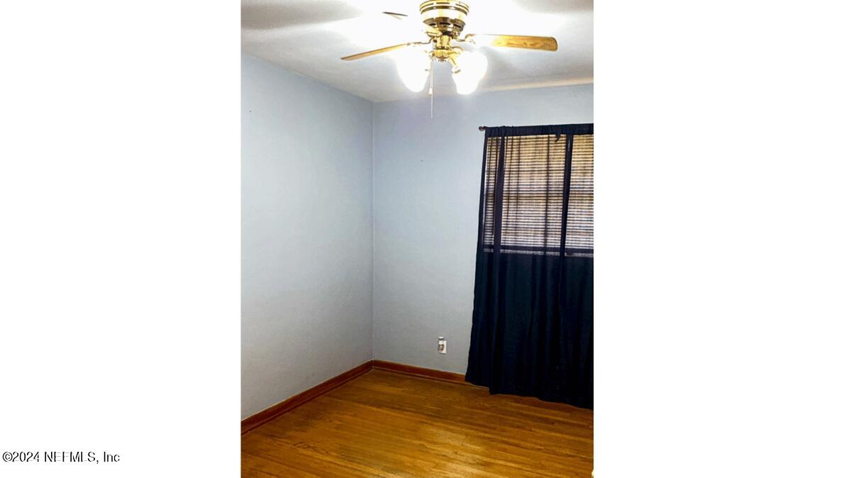 1640 Seminary Street Jacksonville, FL 32209 - Photo 14 of 16 a view of an empty room with a window