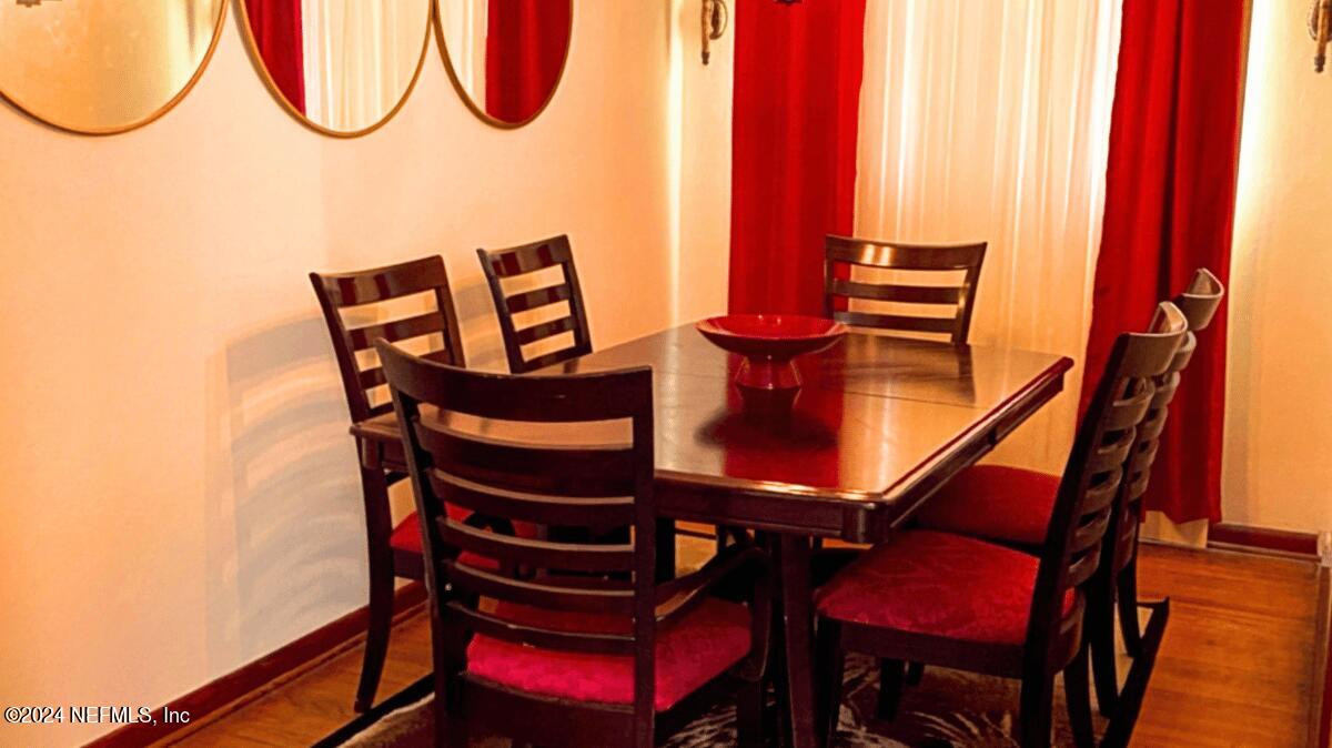 1640 Seminary Street Jacksonville, FL 32209 - Photo 7 of 16 a view of a room with furniture and wooden floor