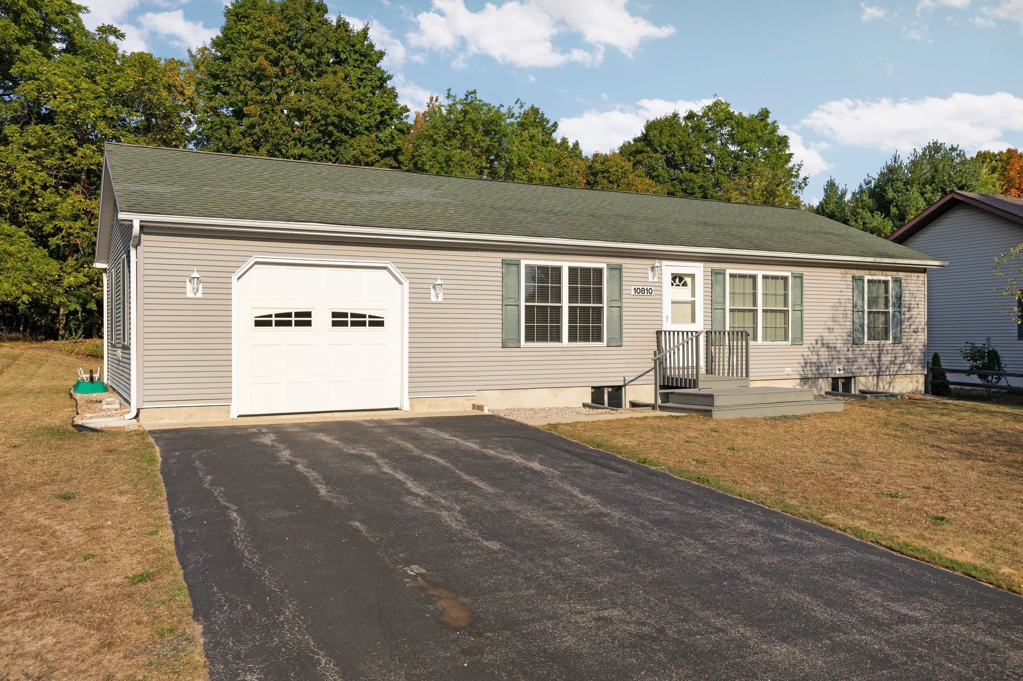 10810 Blue Ridge Lane Traverse City, MI 49684 - Photo 1 of 47 1927905-b04ae0ea-609b-4053-a4ba-e6af5d5c9aae.JPG