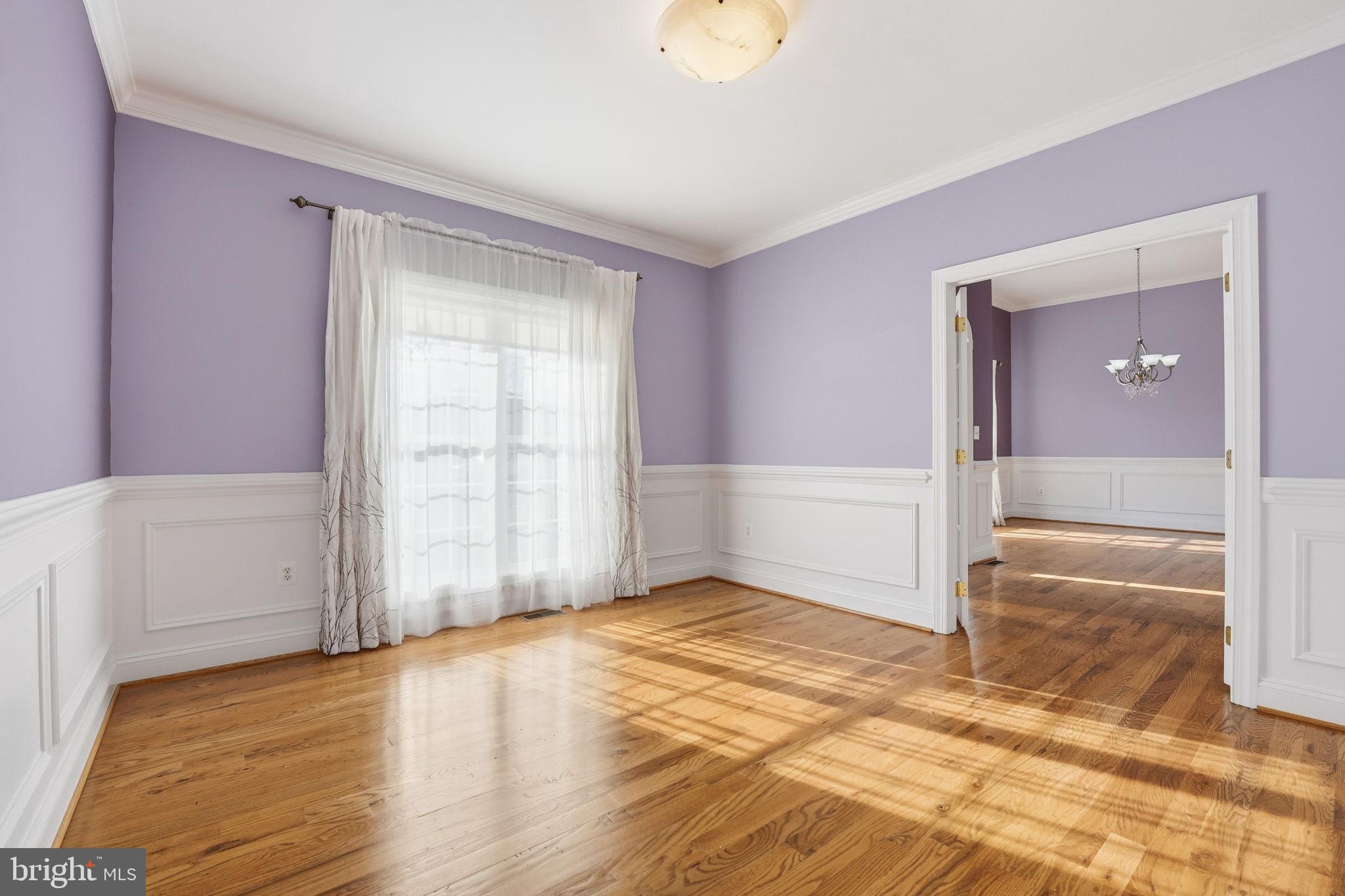 450 Canyon Road Winchester, VA 22602 - Photo 13 of 51 an empty room with wooden floor and windows