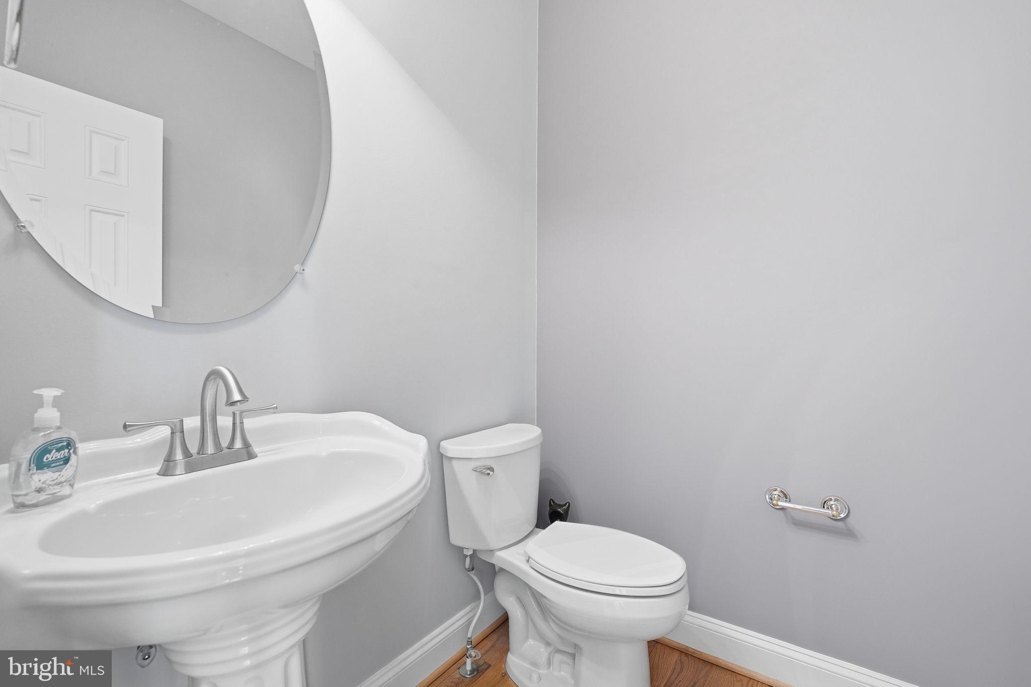 450 Canyon Road Winchester, VA 22602 - Photo 16 of 51 a white toilet sitting next to a bathroom sink