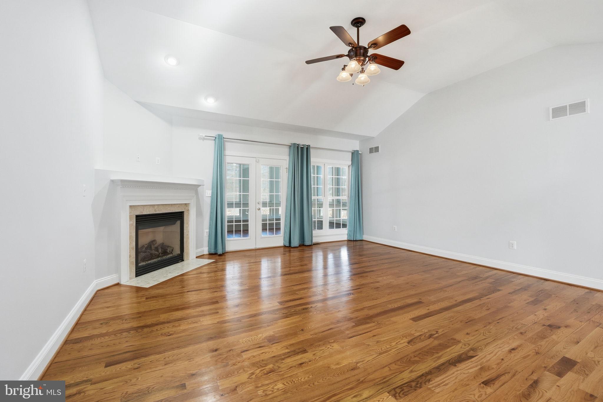 450 Canyon Road Winchester, VA 22602 - Photo 19 of 51 wooden floor in an empty room with a window