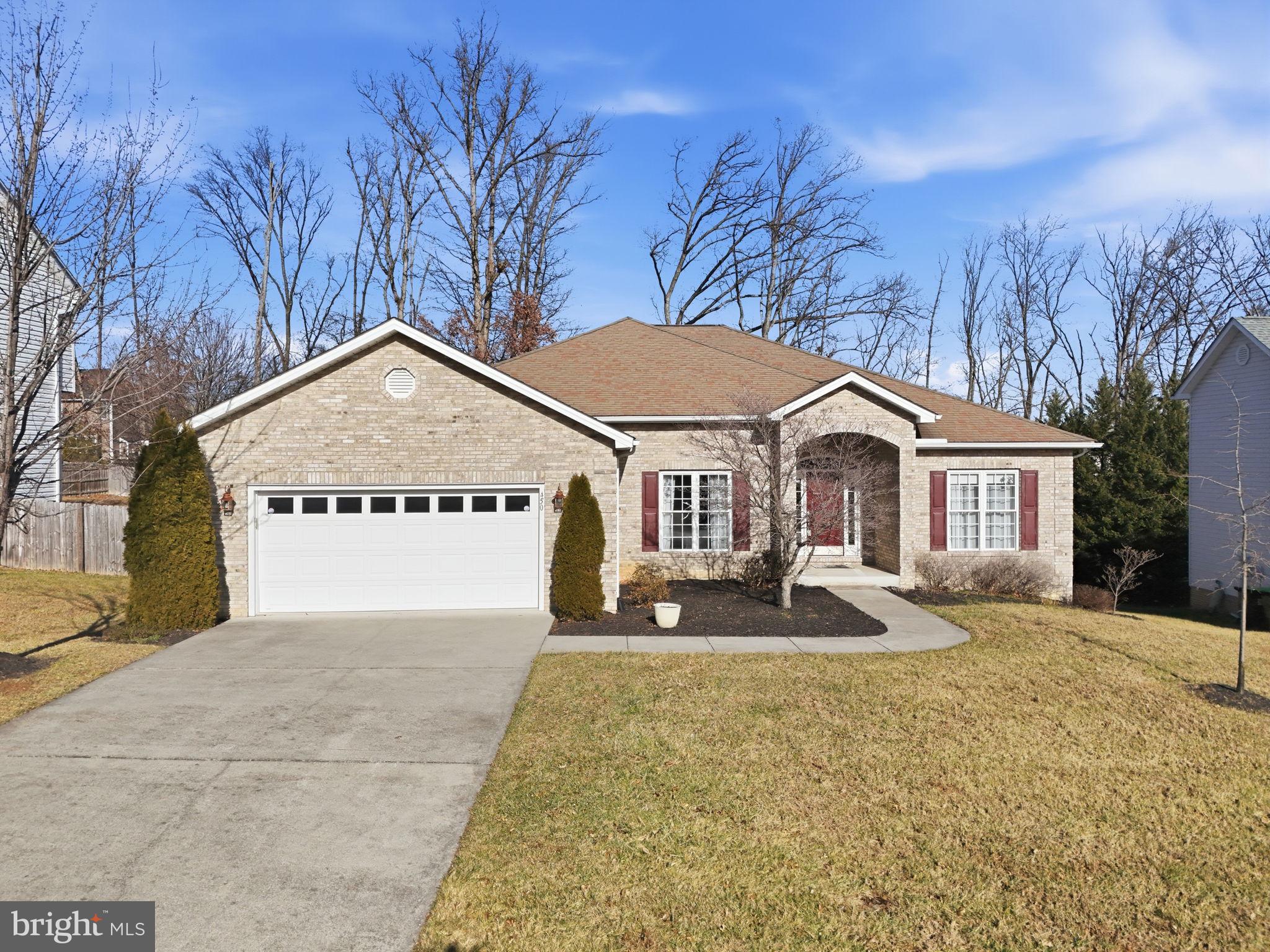 450 Canyon Road Winchester, VA 22602 - Photo 2 of 51 a front view of a house with a yard