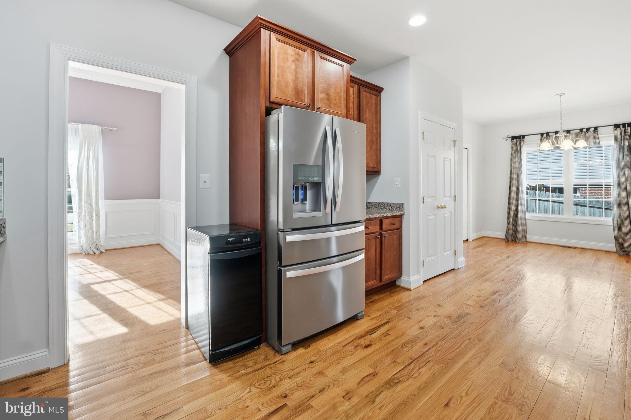 450 Canyon Road Winchester, VA 22602 - Photo 22 of 51 a kitchen with stainless steel appliances granite countertop a refrigerator and a sink