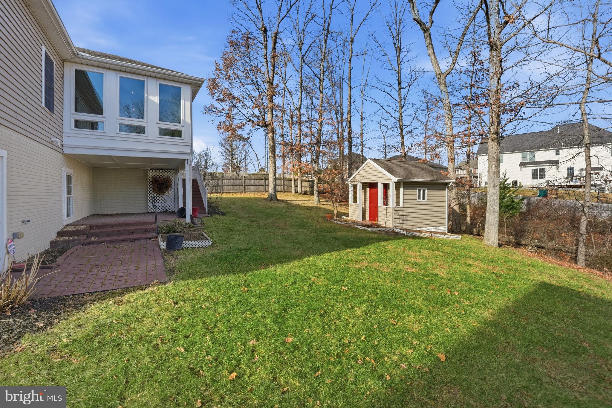 450 Canyon Road Winchester, VA 22602 - Photo 46 of 51 a front view of a house with garden
