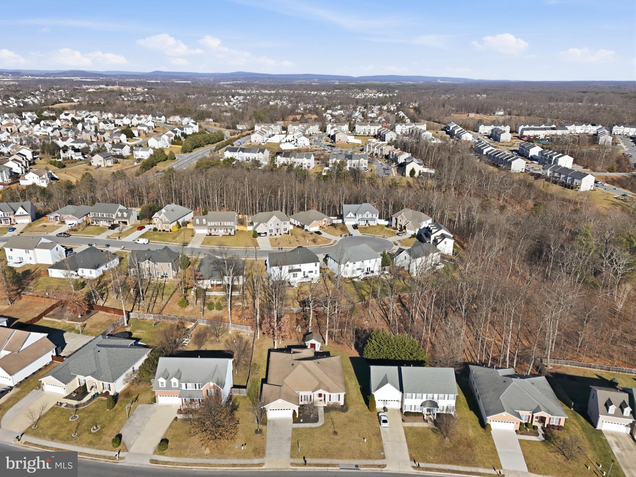 450 Canyon Road Winchester, VA 22602 - Photo 5 of 51 an aerial view of a city with lots of residential buildings
