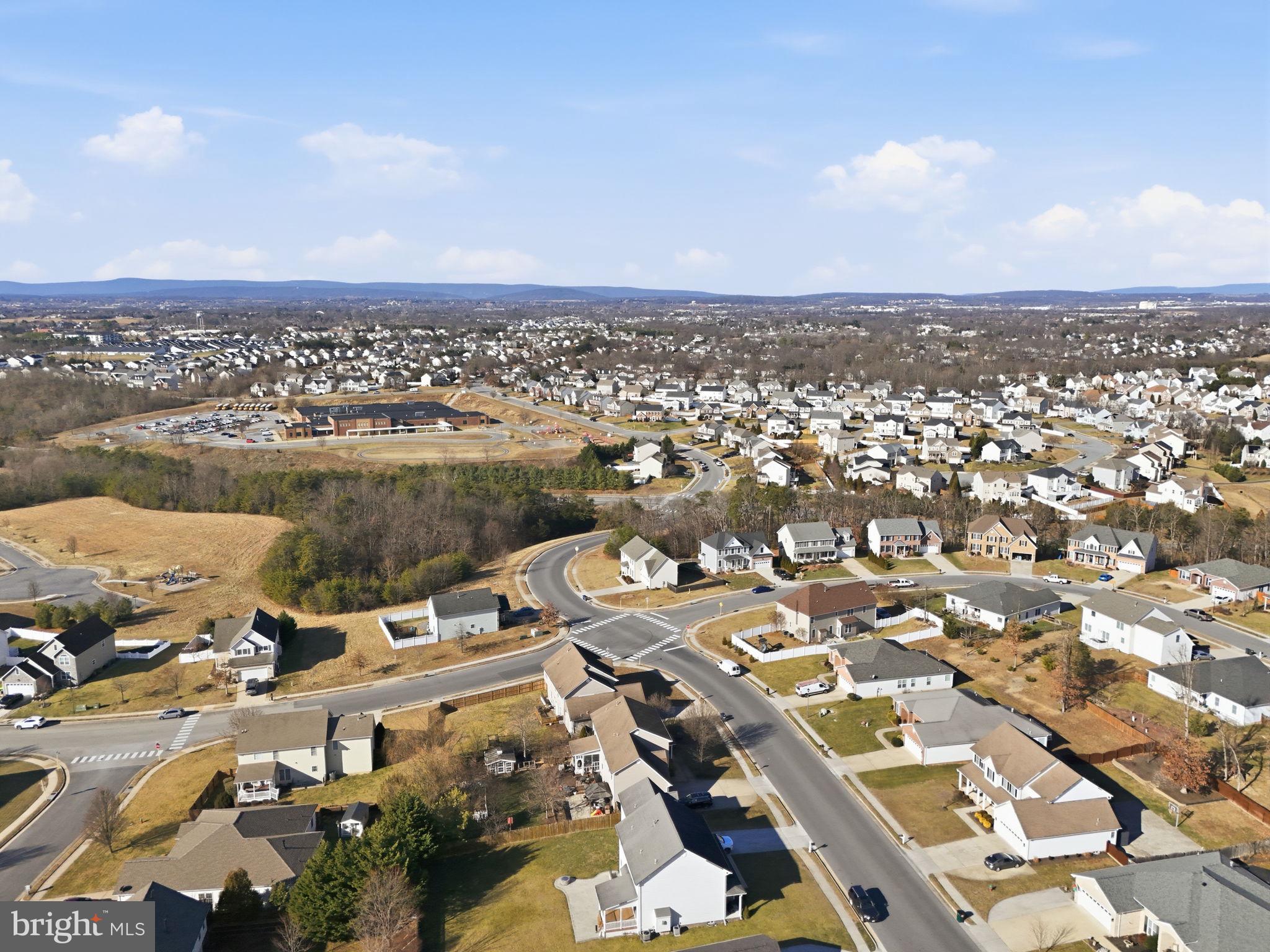 450 Canyon Road Winchester, VA 22602 - Photo 8 of 51 an aerial view of a city with lots of residential buildings