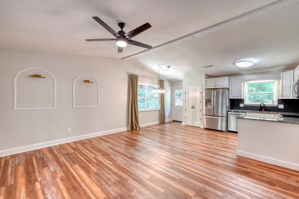 45 Mountain Stream Road Murphy, NC 28906 - Photo 29 of 33 a view of empty room with wooden floor and window