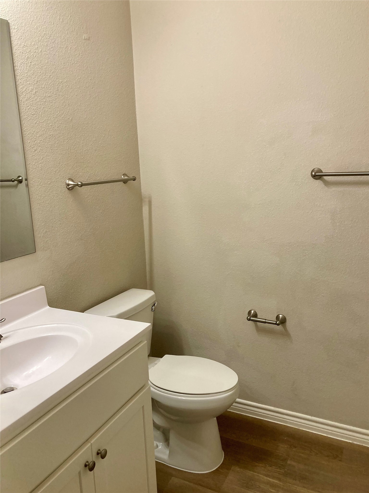 4505 P Galveston, TX 77551 - Photo 11 of 19 a white toilet sitting next to a white sink