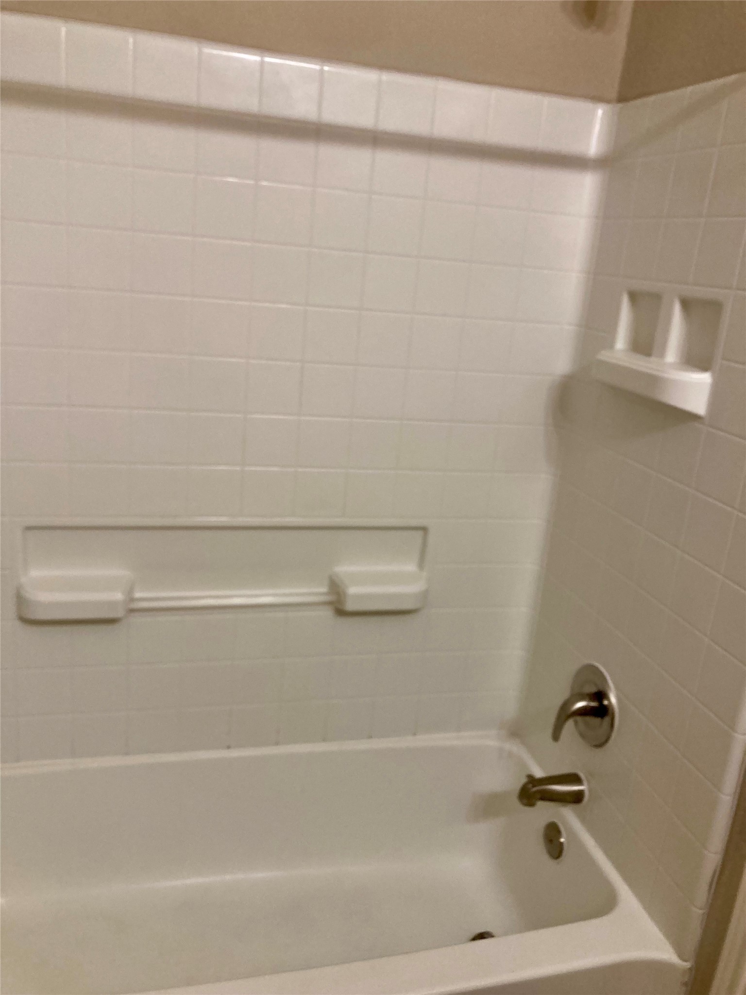 4505 P Galveston, TX 77551 - Photo 12 of 19 a bathroom with a shower and a bath tub