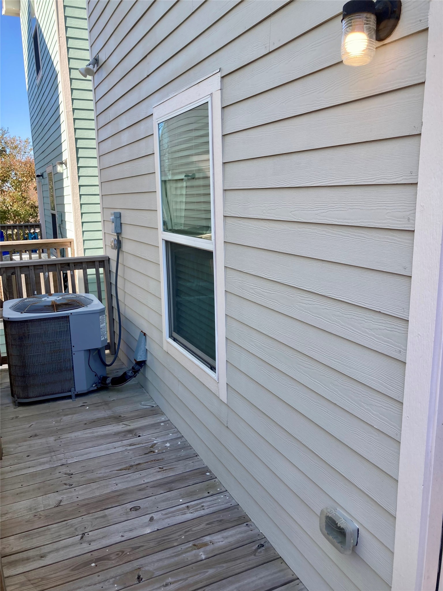 4505 P Galveston, TX 77551 - Photo 9 of 19 a view of a house with wooden deck