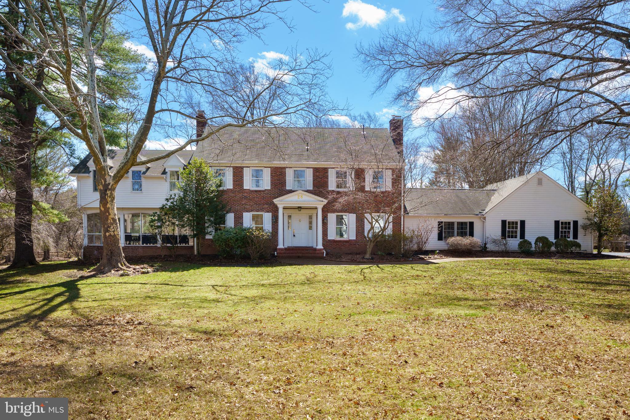 28 Talbot Lane Princeton, NJ 08540 - Photo 1 of 55 a view of a house with a yard and large trees