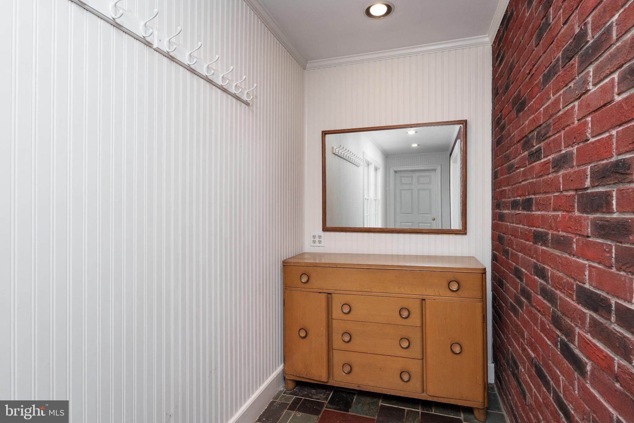 28 Talbot Lane Princeton, NJ 08540 - Photo 21 of 55 a bathroom with a mirror and a sink