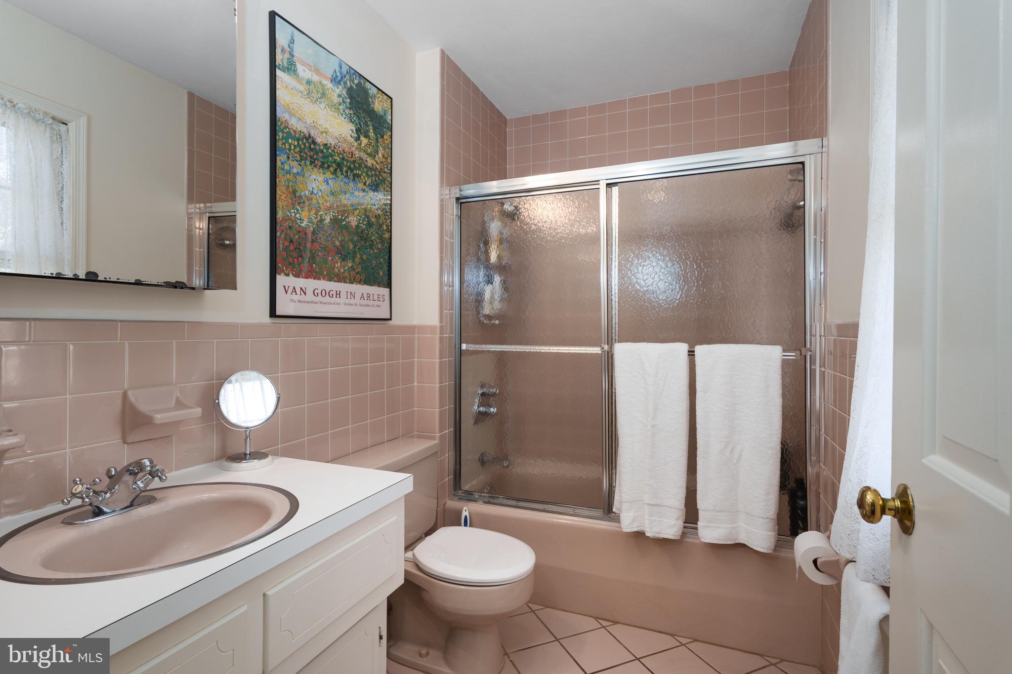 28 Talbot Lane Princeton, NJ 08540 - Photo 26 of 55 a bathroom with a sink toilet a mirror and shower